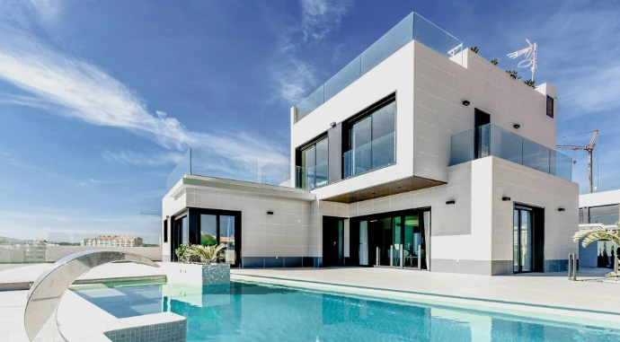white concrete building under blue sky during daytime